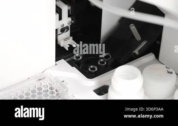 Close up of cuvettes inside an automatic biochemistry analyzer in ...