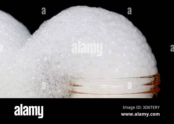 Bubbles forming from dry ice in a jar Stock Video Footage - Alamy