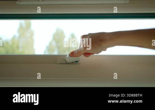 Operating Left Window Opening and closing window handle. Moving window lever performing open ...