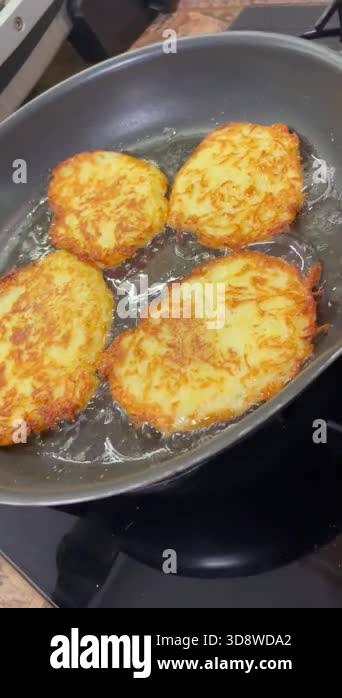 Potato Runes frying pan, potato dishes, fried potatoes in oil on a frying pan ...