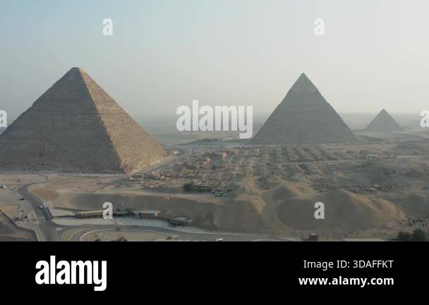 Aerial view of the Giza pyramids, showcasing the iconic structures from ...