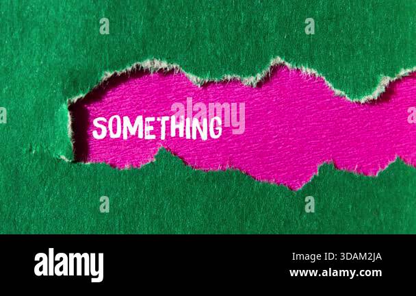 Something new is coming message writing on ripped torn paper background ...