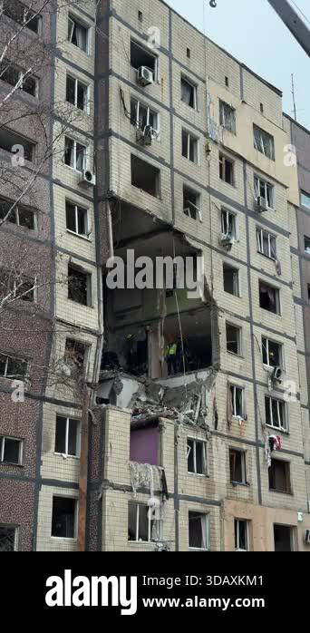 A fragment of the facade of an apartment building, showing extensive ...