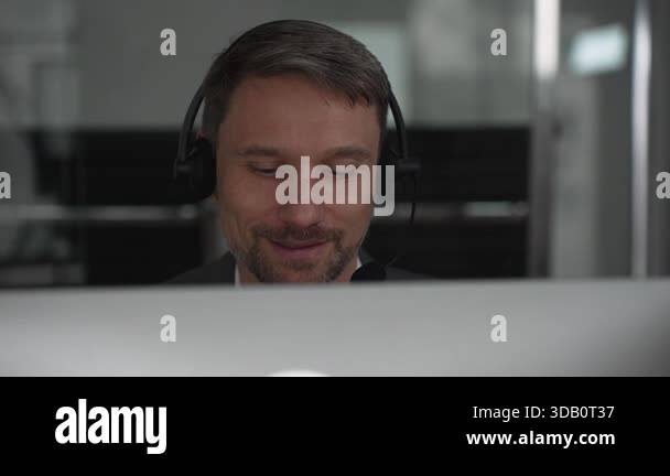 Male customer service representative providing assistance and ...