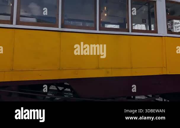 Lisbon, Portugal - March 10, 2025: Historic yellow funicular Elevador ...