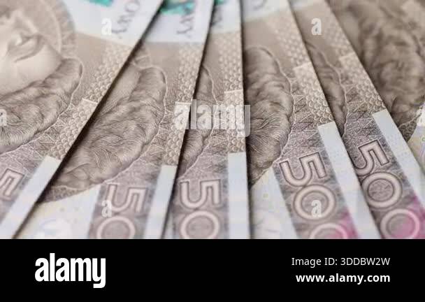 Banknote Shading Pattern A macro rotation of aligned five hundred zloty banknotes arranged in a ...