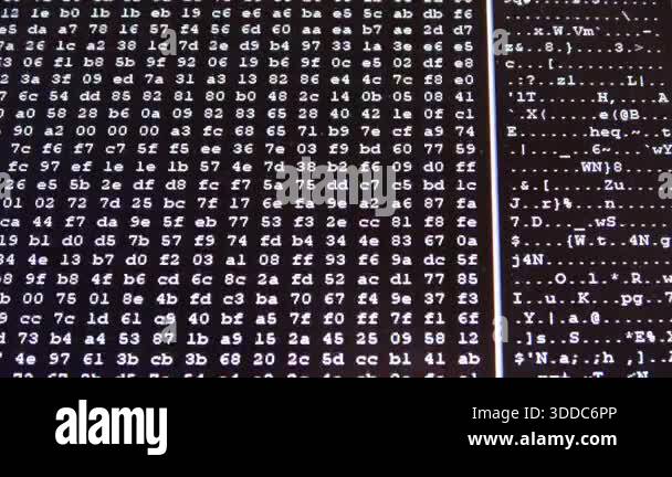 Hexadecimal computer code scrolling up on a dark background ...