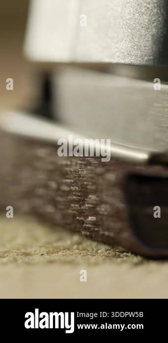 macro precision of sander machine sanding wood board, sawdust and wood ...