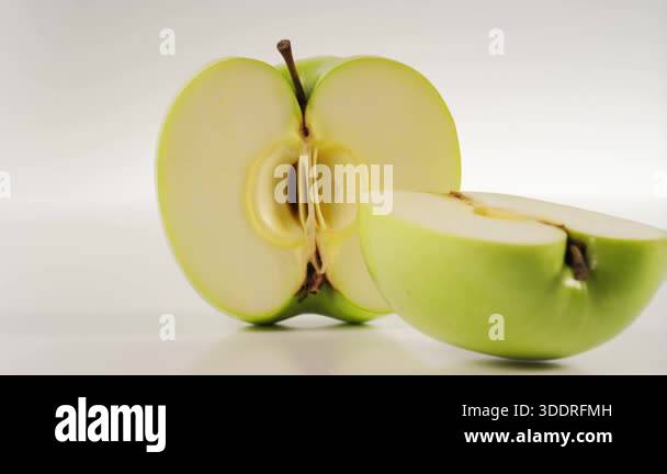 Rotating Apple Animation Realistic worst 3D animation of a whole and sliced apple rotating on a ...