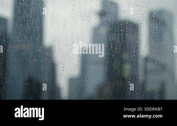 Framing Getting Rained On RainStreaked Window Framing Blurred City Skyline With Raindrops On ...
