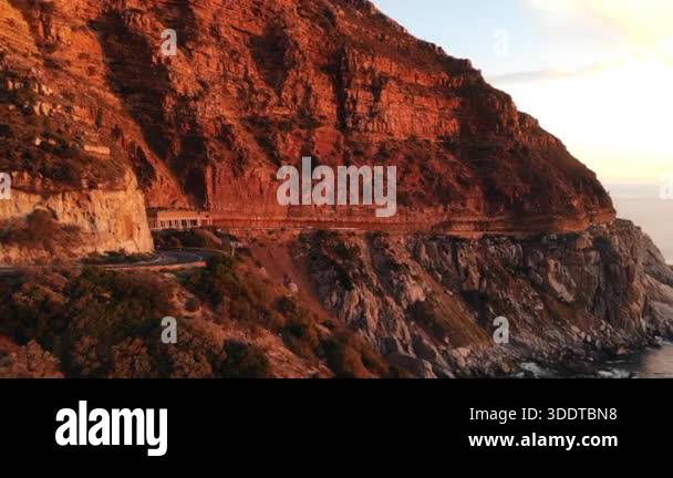 Golden Hour Coastal Cliff Road Sunset Warm Light Bathes Rugged Red Rock ...