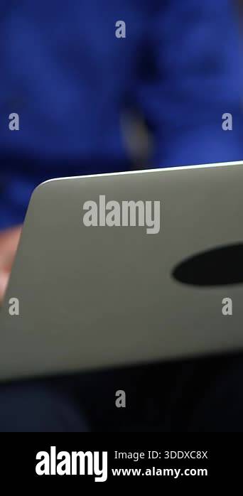 A closeup view of hands actively typing on a laptop, effectively ...