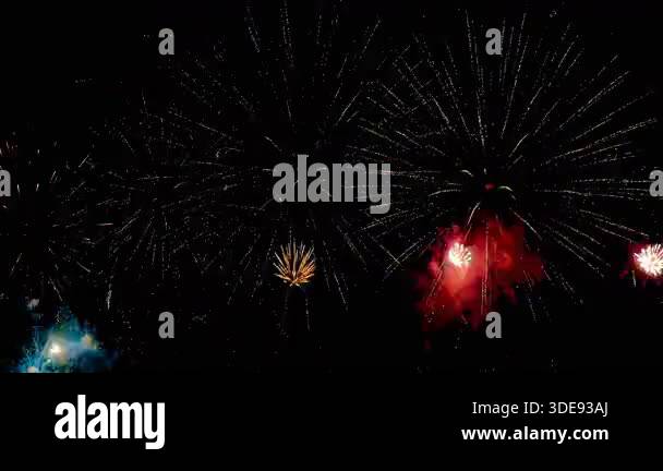 4K. loop seamless of real fireworks background golden shining fireworks ...