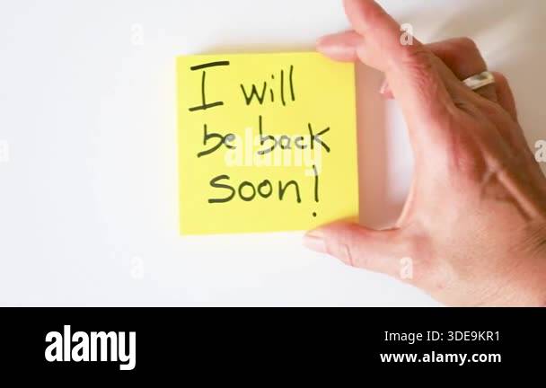 A bright yellow sticky note with I will be back soon! handwritten in ...
