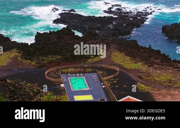 Azores Hot Spring Cliffs Aerial view of Ponta da Ferraria hot springs and the dramatic Atlantic ...