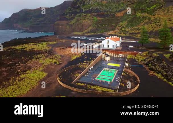 Azores Hot Spring Cliffs Aerial view of Ponta da Ferraria hot springs and the dramatic Atlantic ...