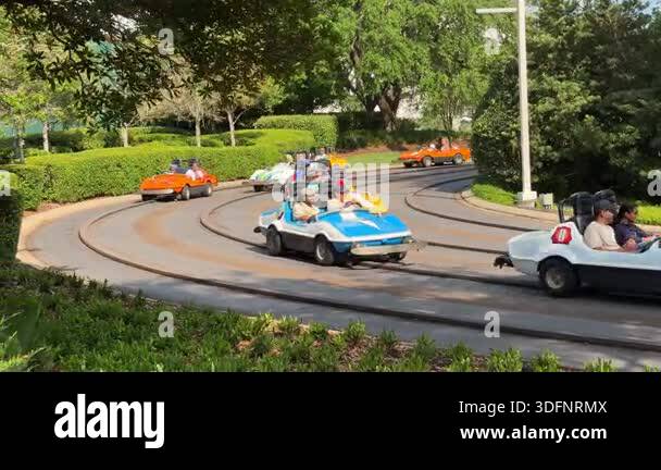 Orlando, Florida, USA - 05.06.2024: Multiple colorful go-karts drive ...