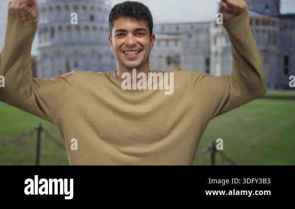 Image shows man raising hands to form horns in rome where hispanic ...