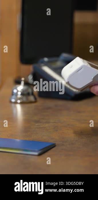 Modern convenience at its finest as a guest uses a smartphone for a ...
