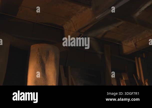 Dust Collector And Stacked Timber In Dim Loft, Rafters And Beams ...