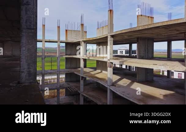 This aerial view showcases the structure of an incomplete building ...