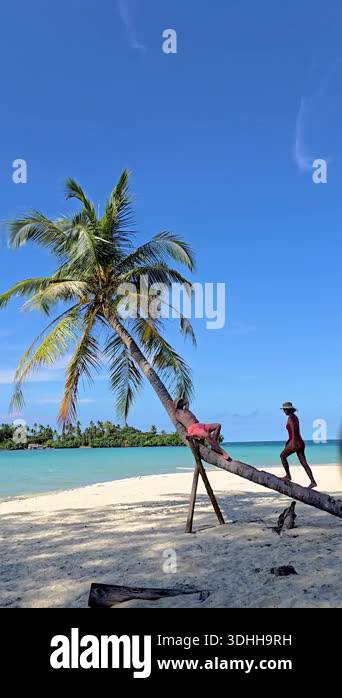 Relax Ladder Relax on the pristine sands of Koh Kood Island, Thailand, where ...
