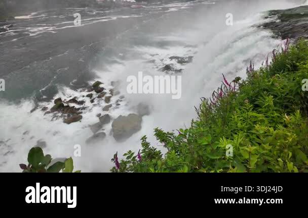 Majestic niagara falls with powerful water cascading down rocks ...