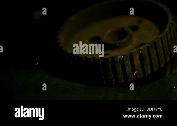 Old Rusty Industrial Metal Gear Wheels Rolling On A Dark Surface With 