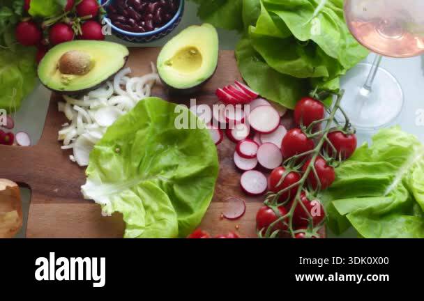 Fresh vegetables including lettuce tomatoes and avocado Stock Video ...