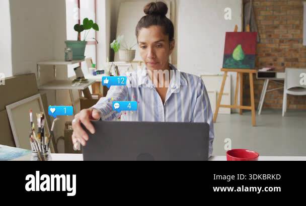 Woman opening laptop tapping as animated social media bubbles rising ...