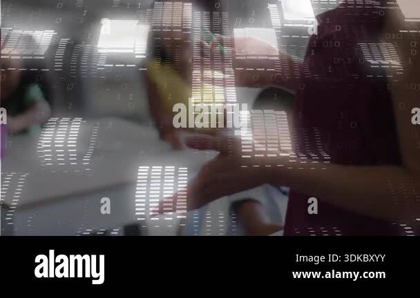 Raising An Object Teacher raising marker toward yellow object at desk sparking blocks ...