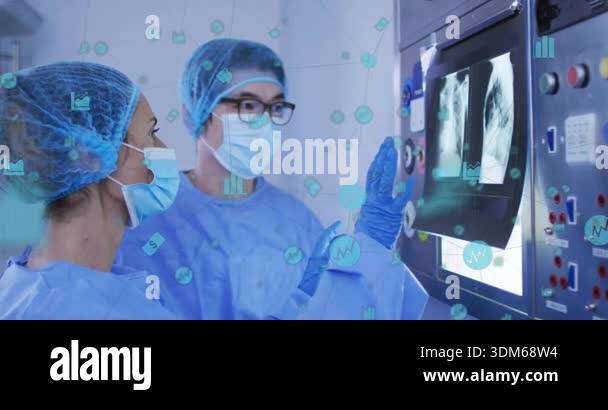Female doctor pointing chest X-ray while peer observing and summoning ...
