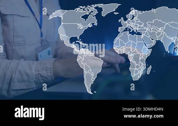 IT pro typing on laptop starting world map overlay expanding across ...