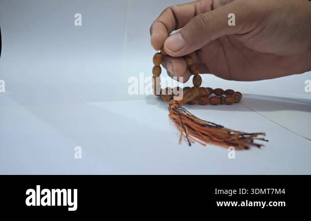 Hand Reciting Dhikr Using Wooden Tasbih Prayer Beads Close Up Detailed ...
