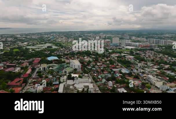 Panay View City with modern resident towers. Beautiful aerial view of Iloilo City ...