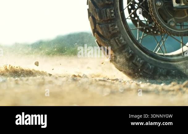 Super Slow Motion Shot of an Off-Road Motorcycle Spinning Its Rear ...