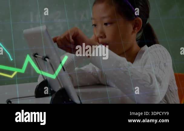 Female student tapping tablet and observing animated graphs rising and ...