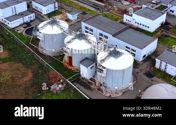 Close up of three large anaerobic digester tanks. High angle shot of ...