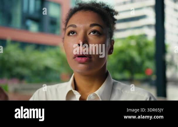Female Executive Exploding African American business woman showing mind brain explosion ...