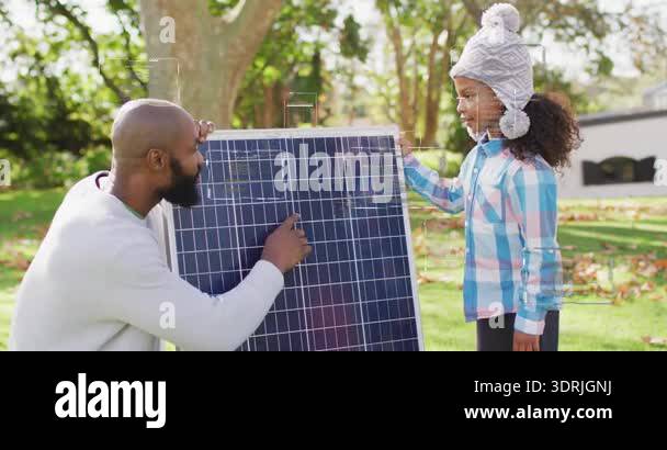 Father kneeling at solar panel tapping cells and explaining animated ...