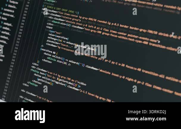 Complex program code displays on a dark monitor screen illustrating ...
