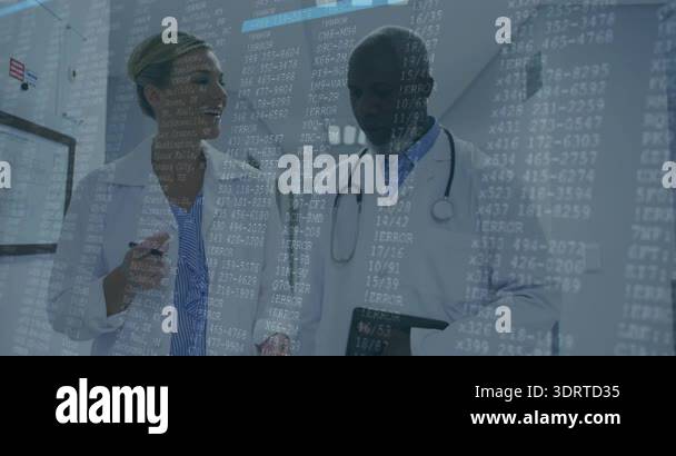 Doctors walking hospital corridor reviewing chart while health data ...