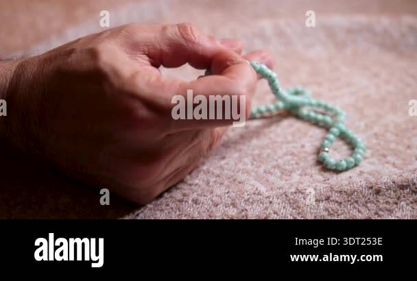Hand Holding Prayer Beads Tesbih Islamic Dhikr Close Up Stock Video ...