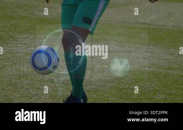 Soccer player tapping ball and juggling on field while HUD tracking ...