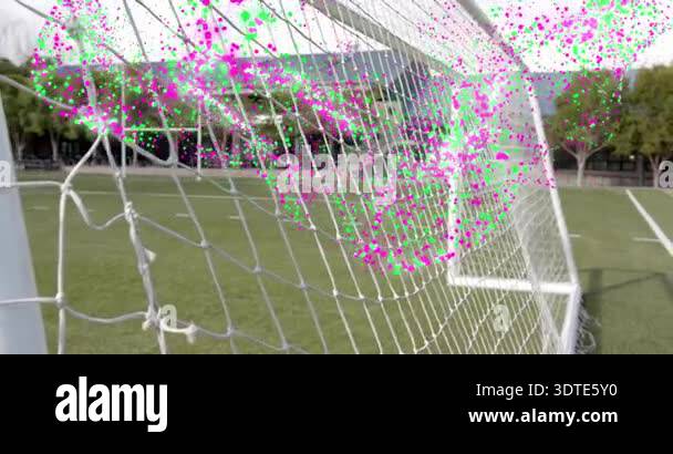 Soccer goal net bulging inward capturing speeding ball rebounding ...