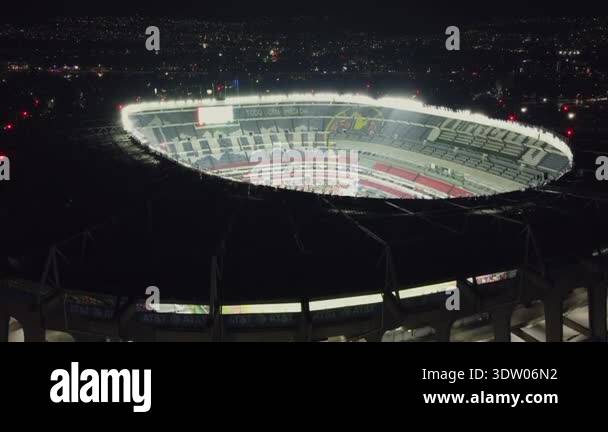 Drone aerial footage of Estadio Azteca illuminated at night in Mexico ...