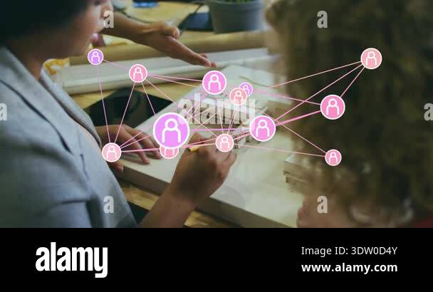 designers moving blocks as pencil hovering sparking pink network icons ...