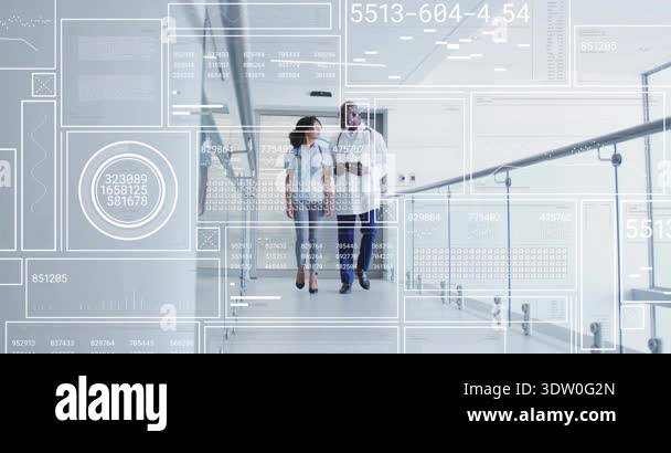 Nurse and doctor walking tapping tablet while activating numeric ...