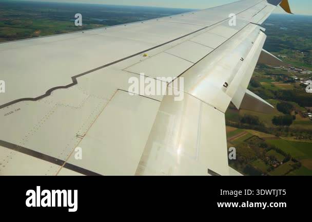 Aircraft hitting air pockets during landing, wing bending. Jet ...