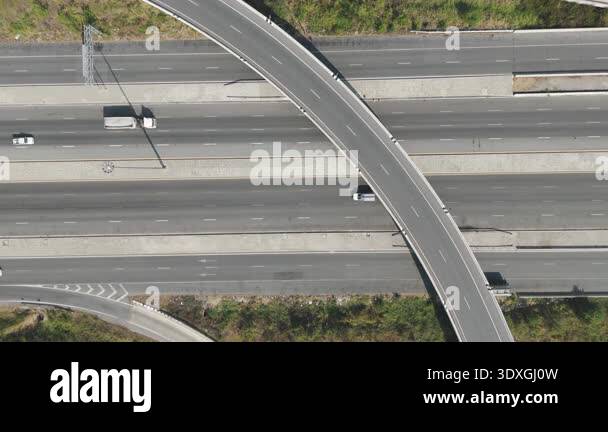 Aerial view of modern highway interchange with multilayer roads and ...